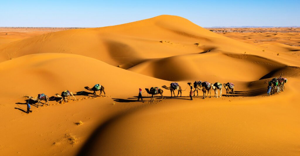 Sunset over the Moroccan desert with sand dunes in Merzouga