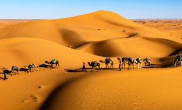 Sunset over the Moroccan desert with sand dunes in Merzouga