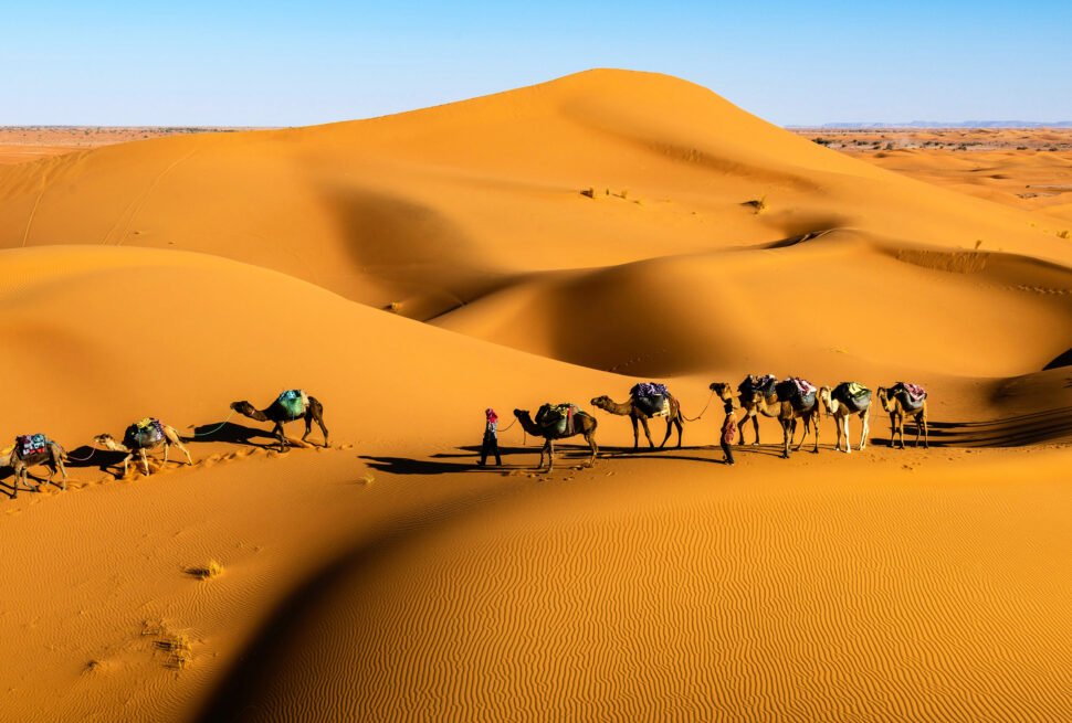 Sunset over the Moroccan desert with sand dunes in Merzouga